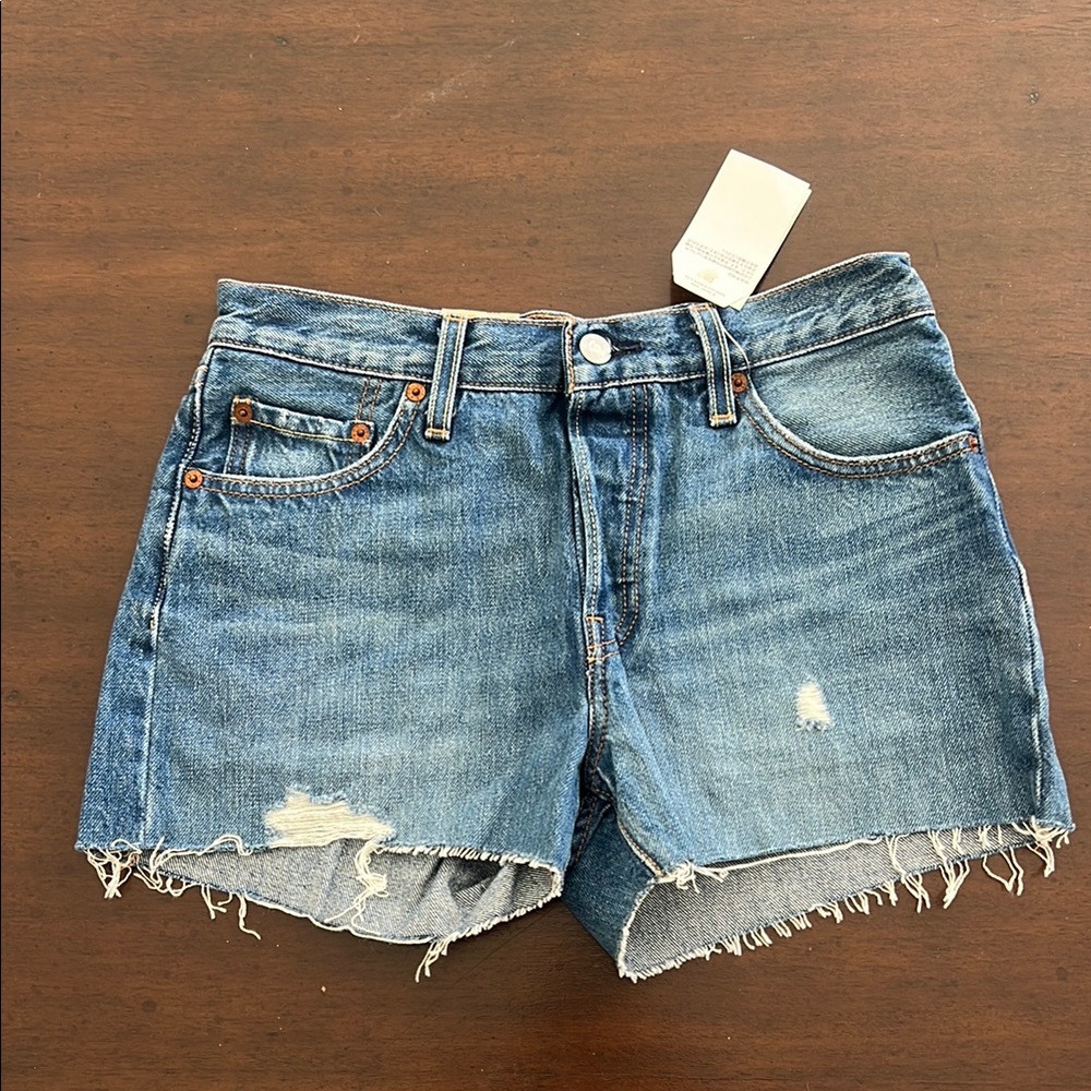 Levi's Blue Jean Shorts with Raw Hem and Distressed Look